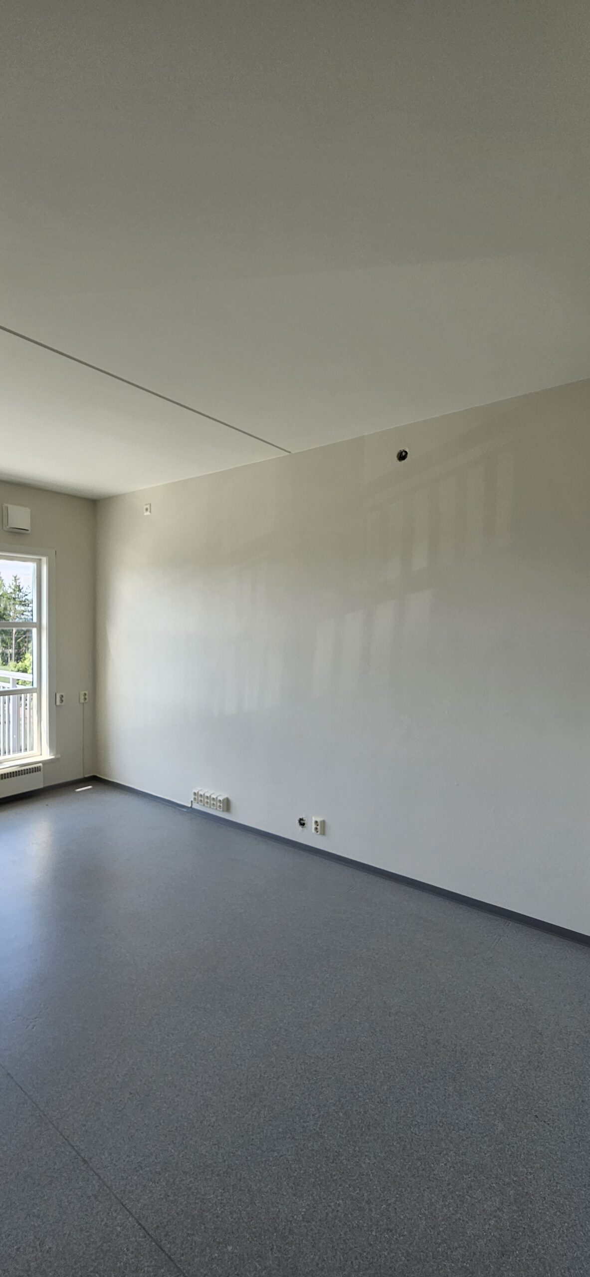 nnvendig maling av stue i Jessheim – jevn finish og rene linjer